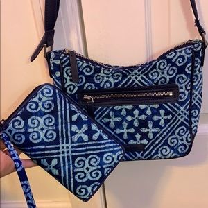 a satchel with a wristlet